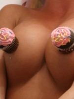 Chase teases with cupcakes on her perky tits
